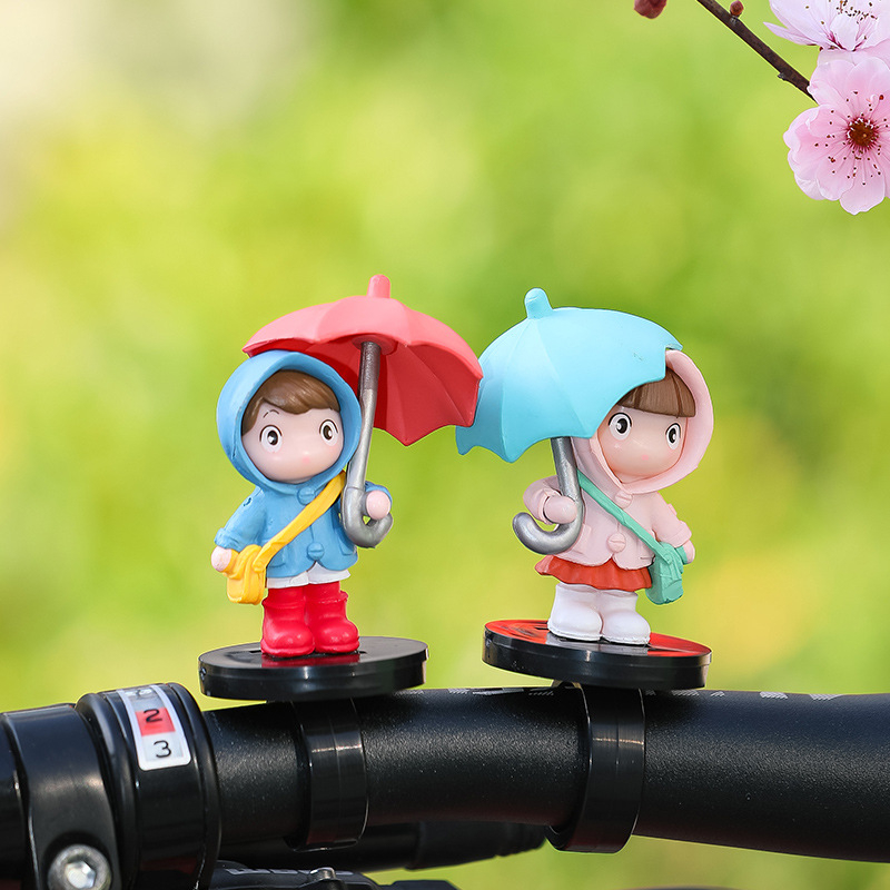 Διάκοσμητικό ποδηλάτου: κοριτσάκι σε καρτούν στυλ υπό ομπρέλα, σχέδιο με λουρί, ύφασμα βισκόζη, μάρκα Tang Yi, διακοσμητικό αξεσουάρ