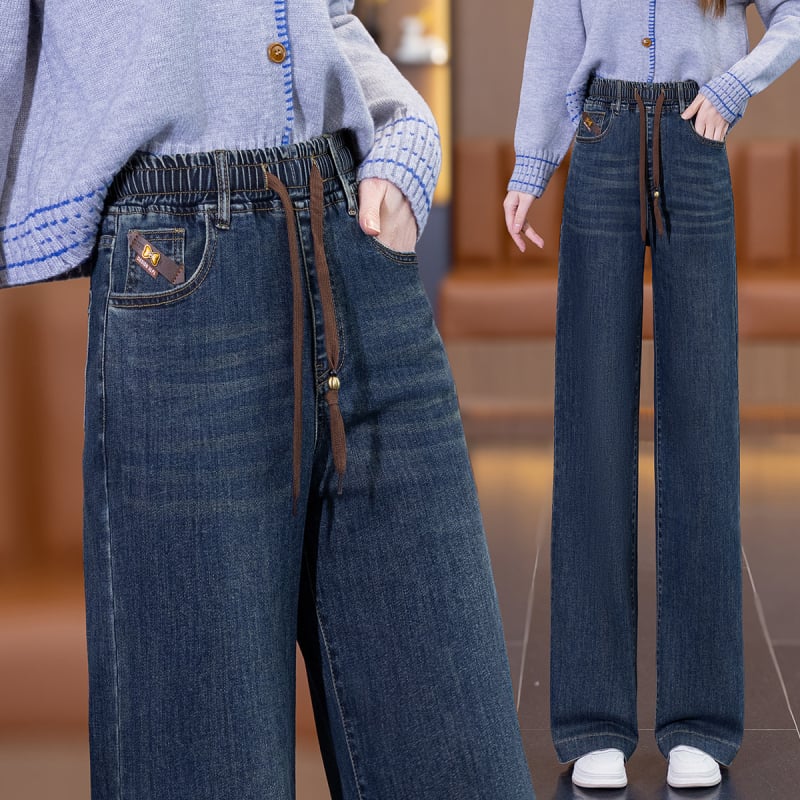 Traperice s visokim strukom, prav kroj, opuštena silueta, elastična struka, pamuk-elastan denim (50–70% pamuka), srednja debljina, zima 2025