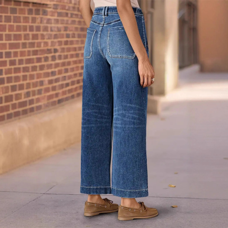 Ženske traperice visokog struka i širokih nogavica, isprani denim, svestran gradski stil