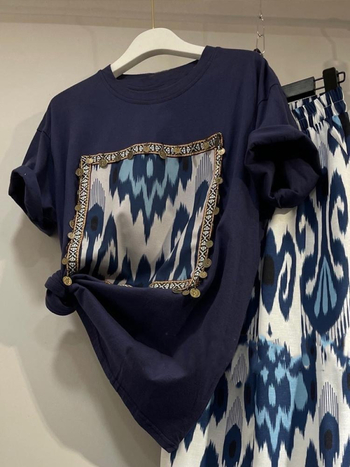 Dvodijelni set: široke hlače visokog struka i vintage print T-shirt kratkih rukava, poliester, glavni sastav 30–50%, slobodan kroj