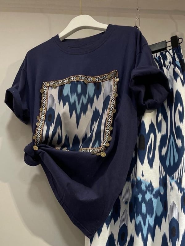 Dvodijelni set: široke hlače visokog struka i vintage print T-shirt kratkih rukava, poliester, glavni sastav 30–50%, slobodan kroj