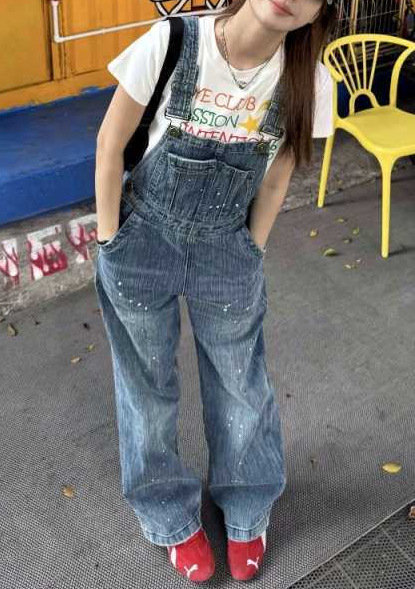 Denim overala s visokim strukom i širokim nogavicama; 80–90% pamuk, spandeks; distressed wash; proljeće 2025, gradski stil