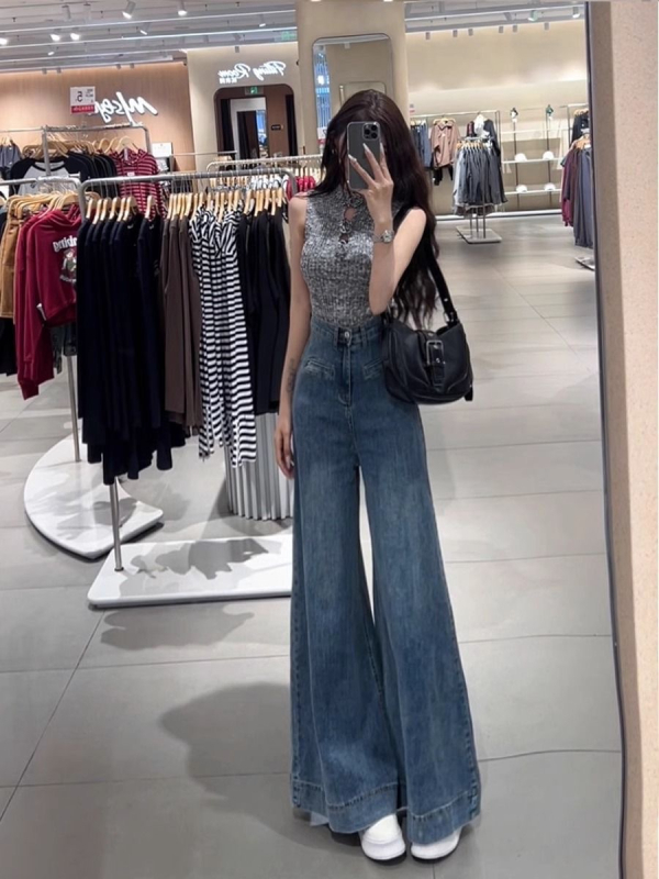 Denim hlače širokih nogavica, visokog struka; mješavina pamuka i poliestera 50–70% pamuk, 30–50% poliester; tretman bez glačanja; ljetni model 2024; street hipster stil