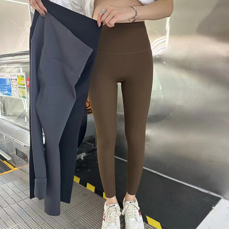 Ženske debeli fleksi bezšivne legginsi od najlona, duljina 9/10, uski kroj, topli