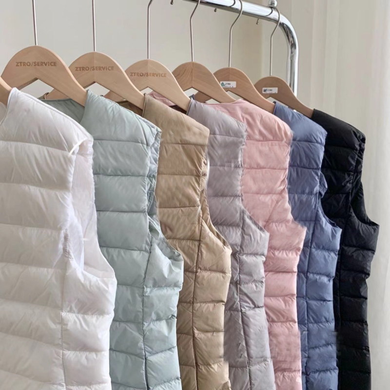 Ženska Slim-Fit down vest s punjenjem od bijelog pačjeg perja, 50% perja, tanak poliester materijal, okrugli ovratnik