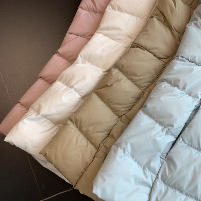 Ženska Slim-Fit down vest s punjenjem od bijelog pačjeg perja, 50% perja, tanak poliester materijal, okrugli ovratnik