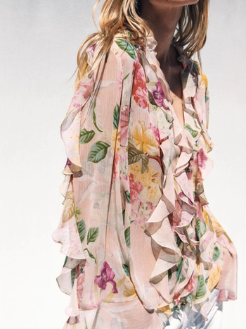 Bluza dama poliester cu imprimeu floral, decolteu în V, mâneci lungi, croială lejeră, detaliu decorativ în straturi