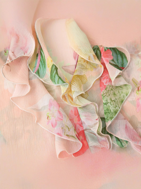 Bluza dama poliester cu imprimeu floral, decolteu în V, mâneci lungi, croială lejeră, detaliu decorativ în straturi