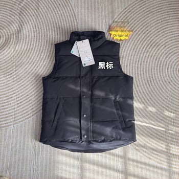 Женска жилетка от гъши пух със стойка яка, външен материал памучно‑смесен, подплата найлон, зима и есен