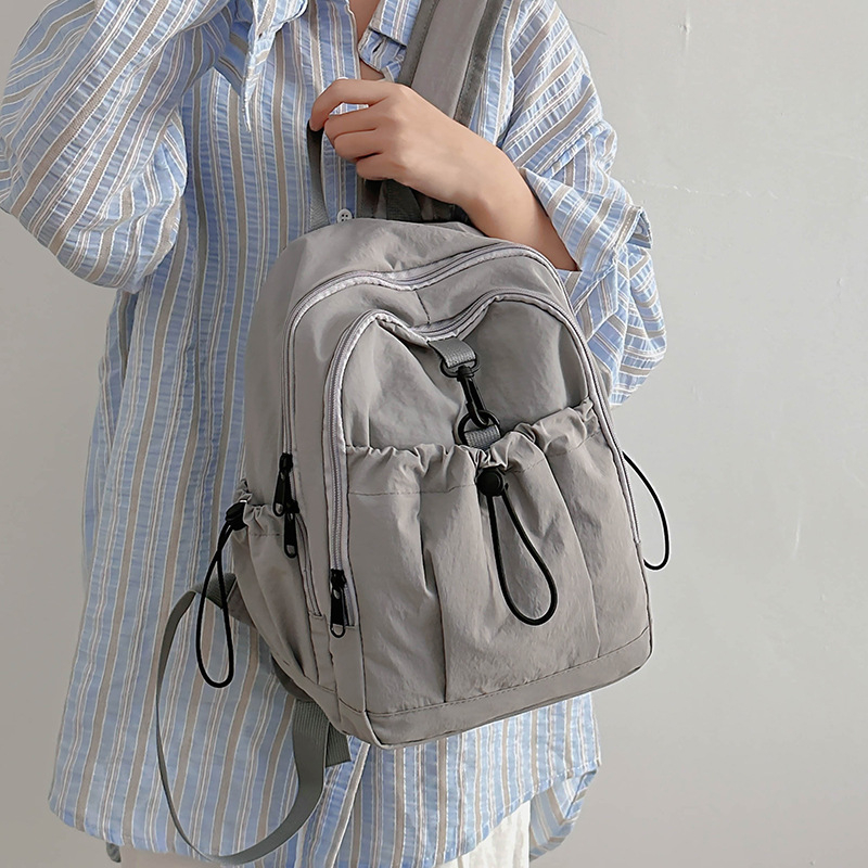 Unisex vanjski mini ruksak, nylon, kapacitet ispod 20 L, kompatibilan s 14-inčnim laptopom, vodootporan, zakrivljene ramenske trake