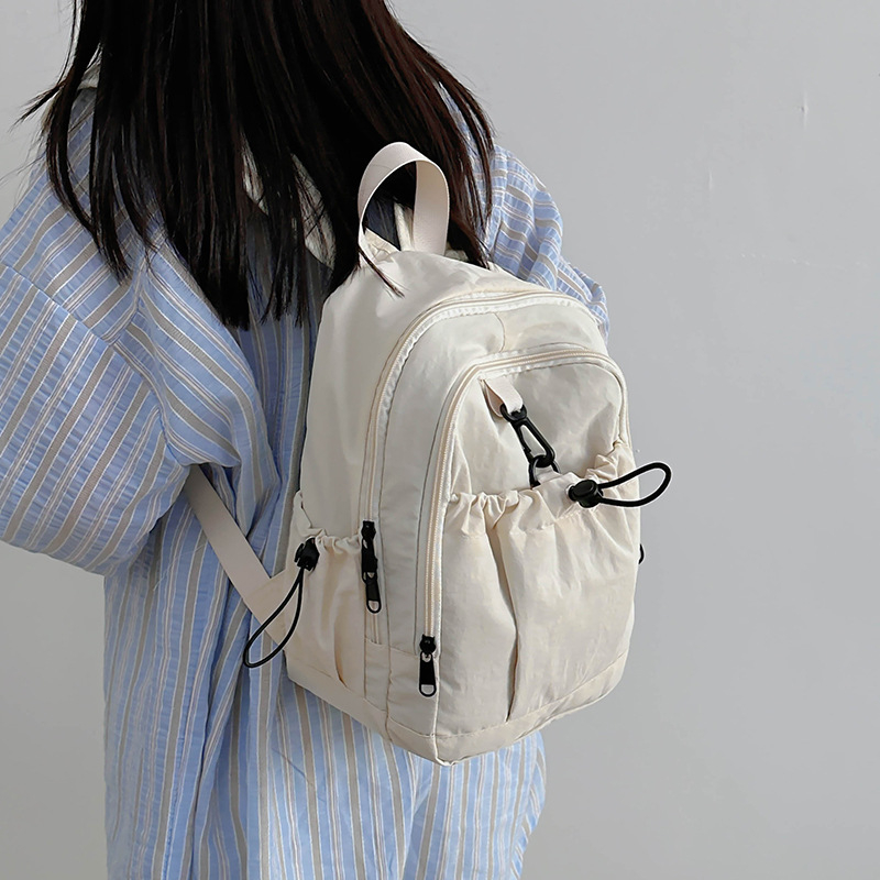 Unisex vanjski mini ruksak, nylon, kapacitet ispod 20 L, kompatibilan s 14-inčnim laptopom, vodootporan, zakrivljene ramenske trake