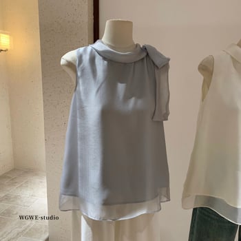 Šifon bluza, poliester 70–80%, okrugli izrez, bez rukava, slobodan kroj