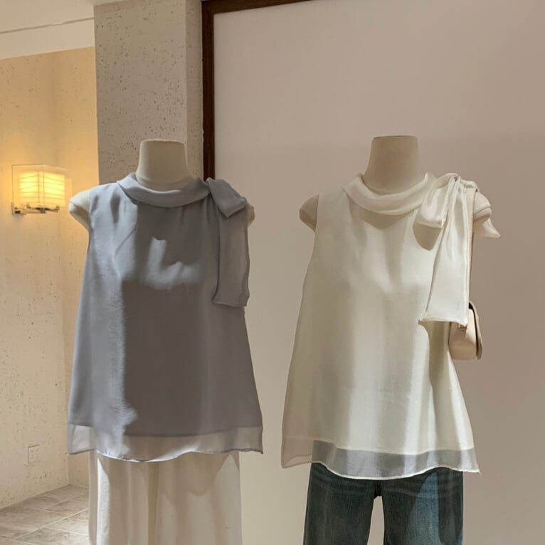 Šifon bluza, poliester 70–80%, okrugli izrez, bez rukava, slobodan kroj