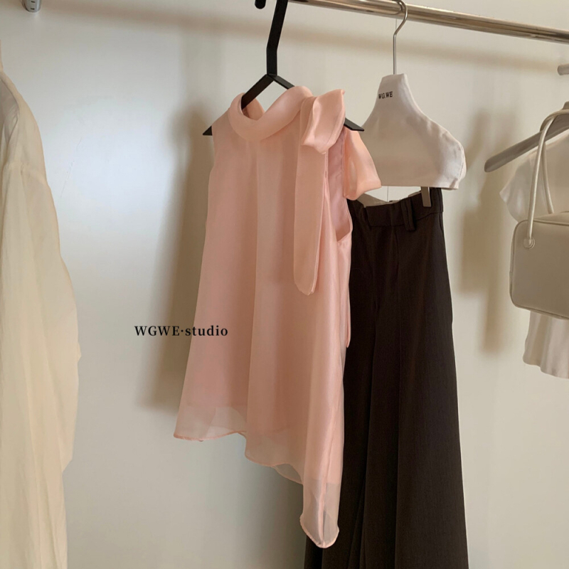 Šifon bluza, poliester 70–80%, okrugli izrez, bez rukava, slobodan kroj