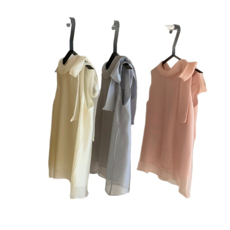 Šifon bluza, poliester 70–80%, okrugli izrez, bez rukava, slobodan kroj