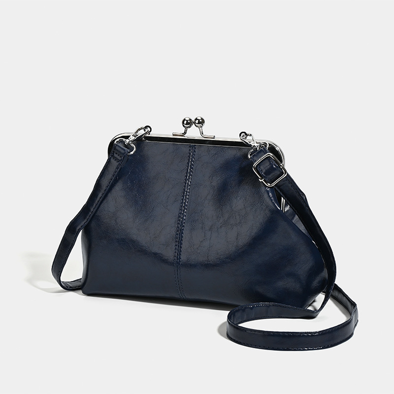 Crossbody bucket torba velike kapacitete, PU materijal, trodimenzionalni oblik školjke, zatvaranje zipom, unutarnja džep za telefon, jedna naramenica
