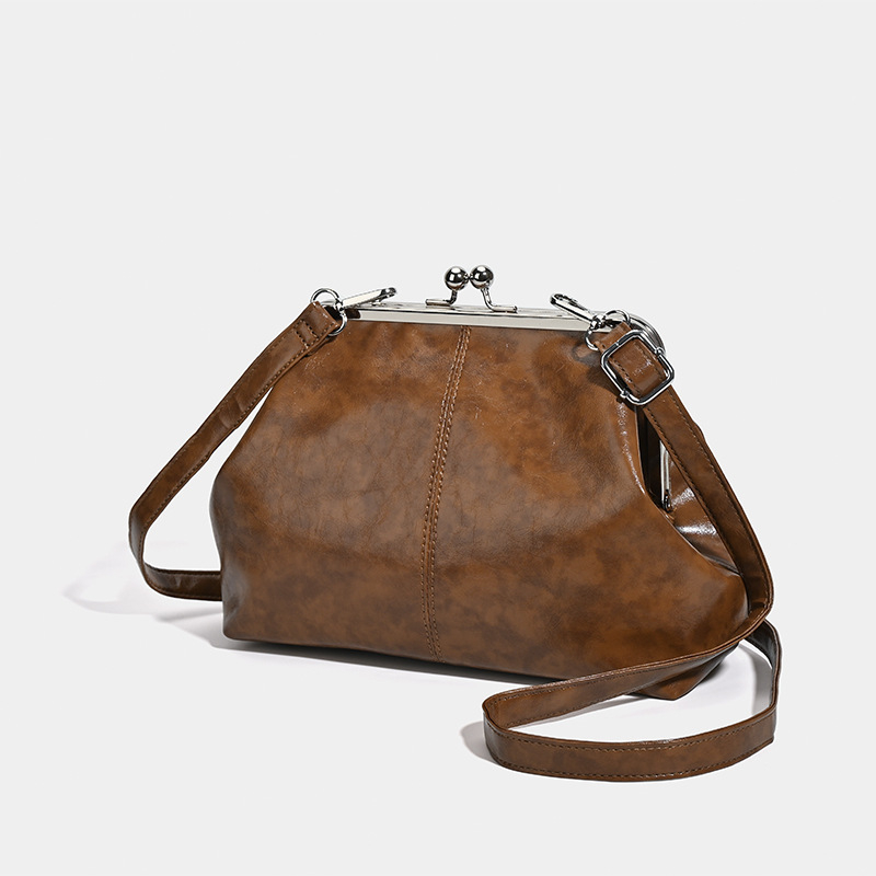 Crossbody bucket torba velike kapacitete, PU materijal, trodimenzionalni oblik školjke, zatvaranje zipom, unutarnja džep za telefon, jedna naramenica