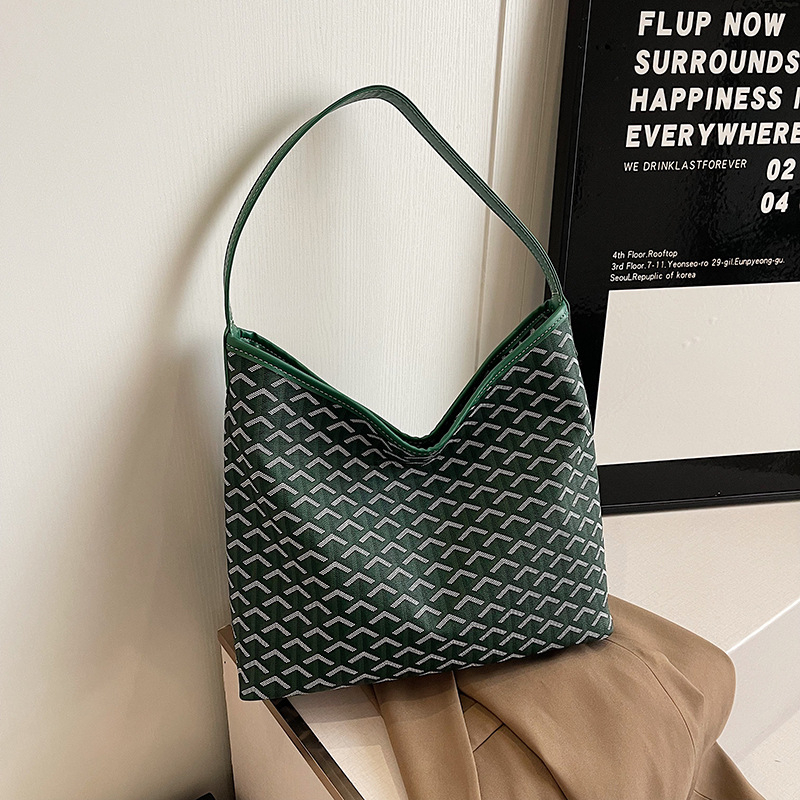 PU crossbody torba, gradski minimalistički stil, oblik bucket, zatvarač, unutarnji džepovi za telefon i dokumente, poliester podstava.