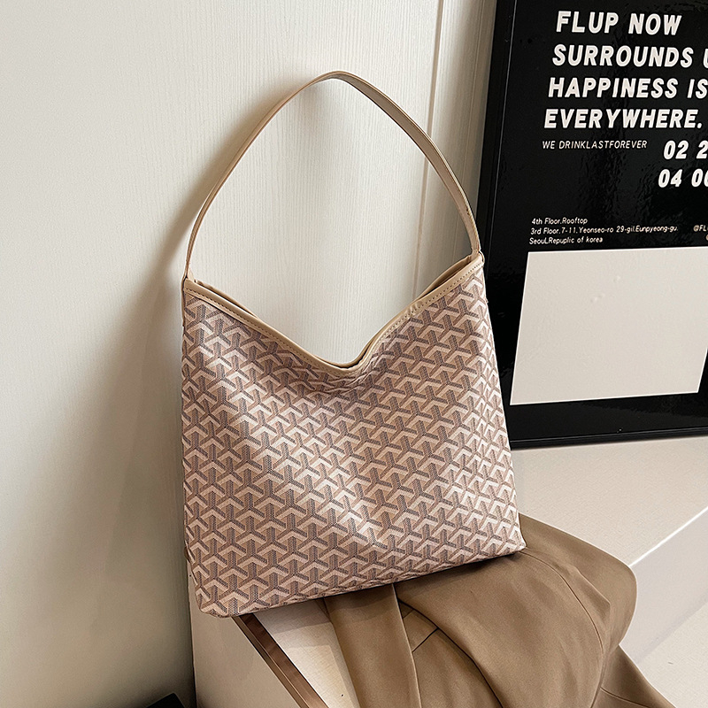 PU crossbody torba, gradski minimalistički stil, oblik bucket, zatvarač, unutarnji džepovi za telefon i dokumente, poliester podstava.