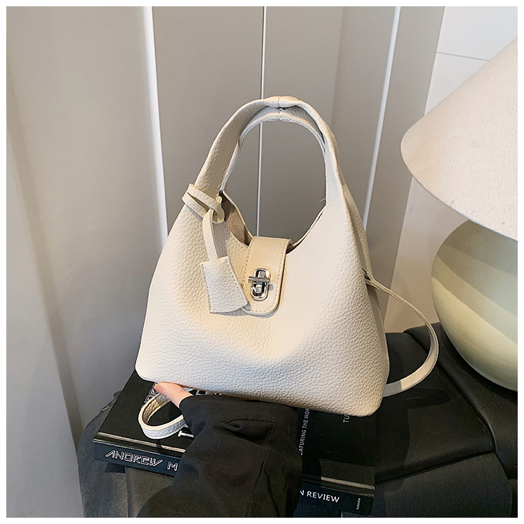 Ženska crossbody torba u obliku kante – PU koža, zaključavanje kopčom, džep za telefon, s jednom naramenicom, urbani minimalistički stil