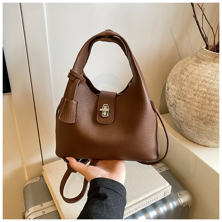 Ženska crossbody torba u obliku kante – PU koža, zaključavanje kopčom, džep za telefon, s jednom naramenicom, urbani minimalistički stil