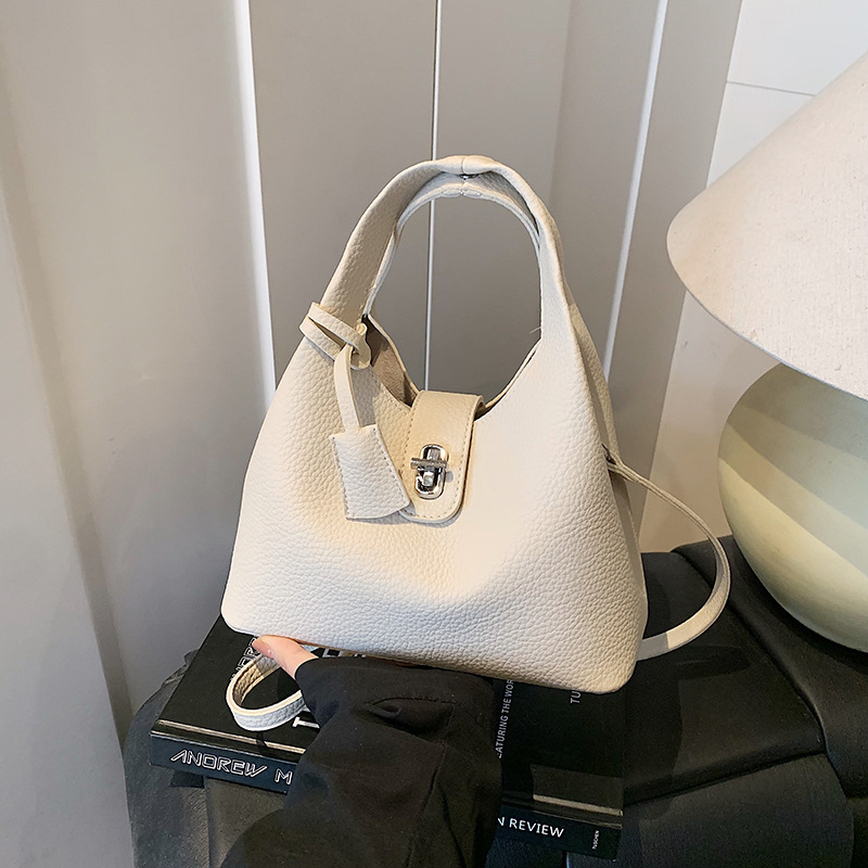 Ženska crossbody torba u obliku kante – PU koža, zaključavanje kopčom, džep za telefon, s jednom naramenicom, urbani minimalistički stil