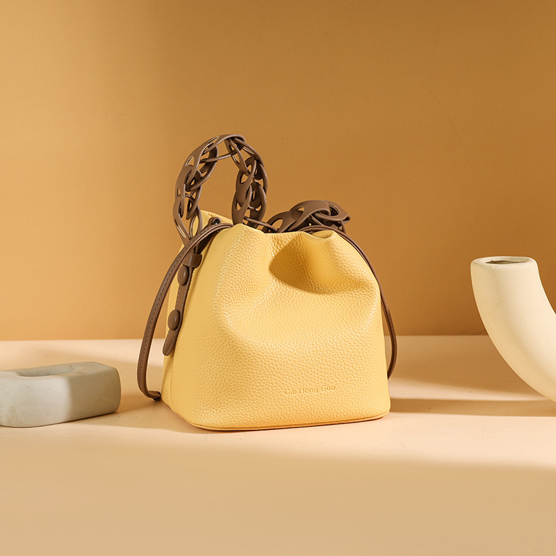 Ženska PU bucket torba, francuski stil, zimsko izdanje 2025, zatvarač na špagu, poliester podstava, gradski minimalistički dizajn, dnevna crossbody