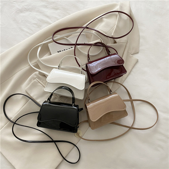 Torba za ramena urbana minimalist PU — mali kvadratni dizajn, horizontalni kvadratni oblik, 2025 ljeto (Stil: Urban Minimalist; Materijal: PU; Trend: Mali kvadratni dizajn; Oblik: Horizontalni kvadrat; Lansiranje: 2025 Ljeto)