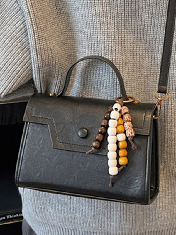 Ženska crossbody torba, gradska jednostavnost, PU materijal, vodoravni kvadratni oblik, zatvaranje s klapnom, poliester podstava