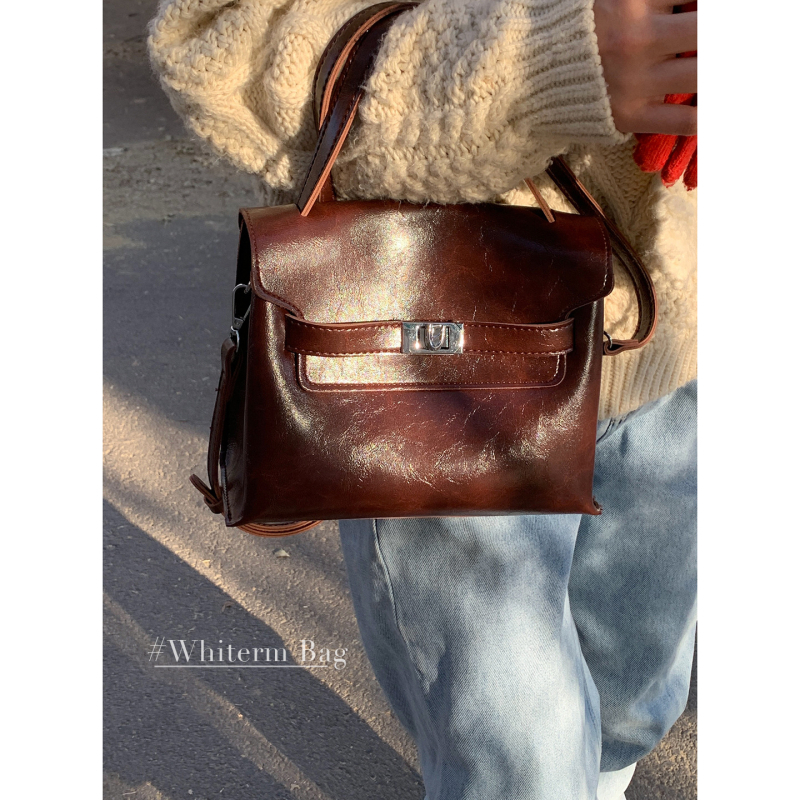 PU crossbody torba, gradski minimalistički stil, vertikalno kvadratni oblik, zima 2025, zaključavanje lokotom