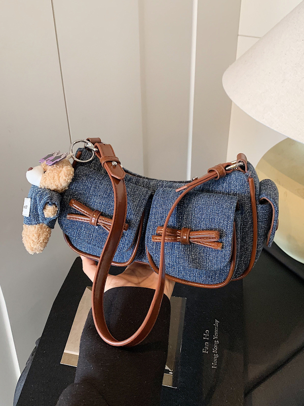 Denim crossbody torbica, gradski minimalistički stil, zatvarač, džep za mobitel, poliester podstava, jedna naramenica