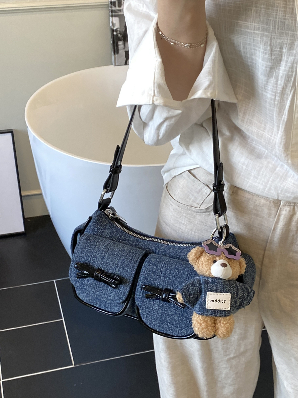 Denim crossbody torbica, gradski minimalistički stil, zatvarač, džep za mobitel, poliester podstava, jedna naramenica