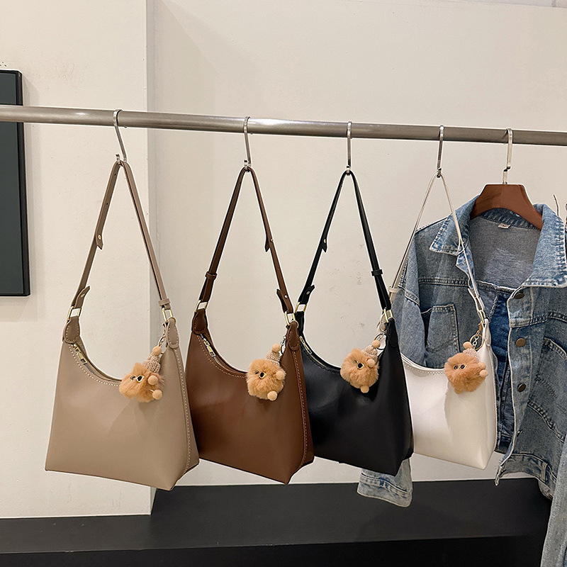 Crossbody torba od PU-a, dumpling-oblik, zatvaranje zipom, bez podstave, s jednom naramenicom