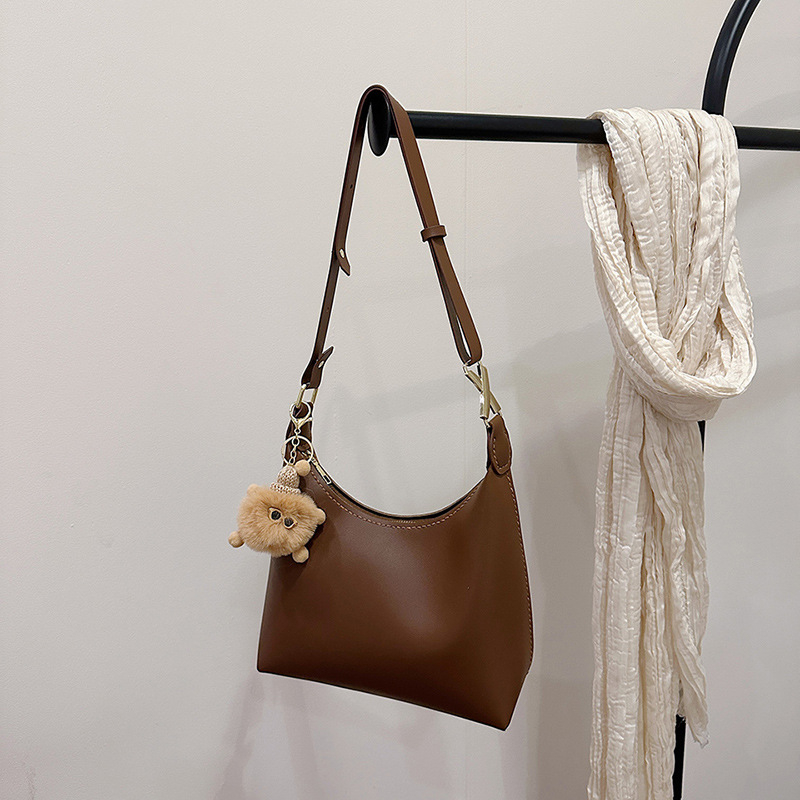 Crossbody torba od PU-a, dumpling-oblik, zatvaranje zipom, bez podstave, s jednom naramenicom