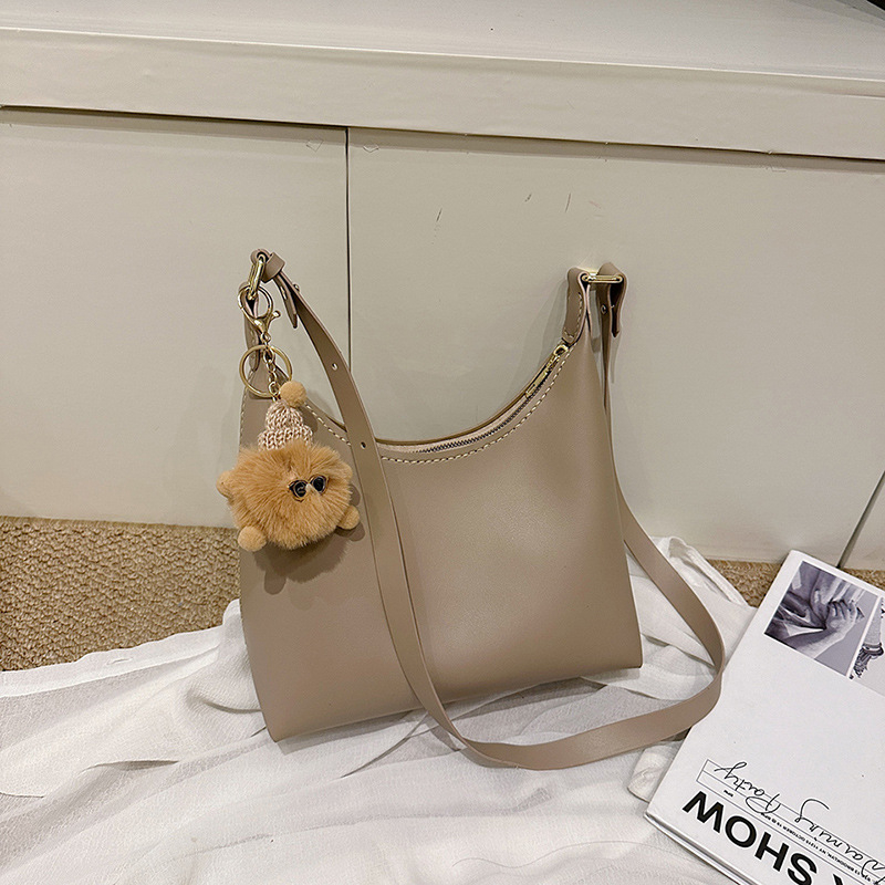 Crossbody torba od PU-a, dumpling-oblik, zatvaranje zipom, bez podstave, s jednom naramenicom
