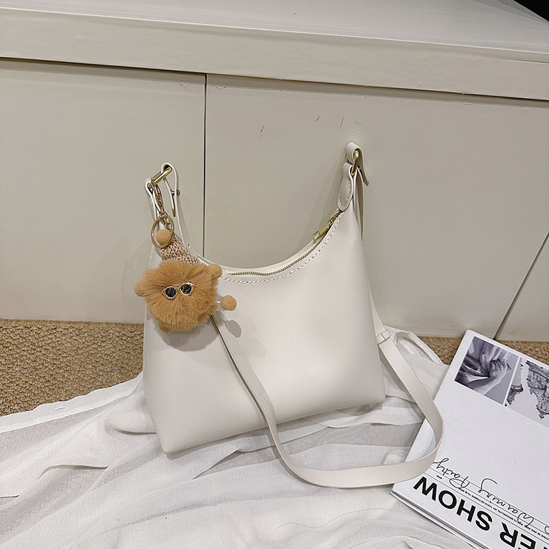 Crossbody torba od PU-a, dumpling-oblik, zatvaranje zipom, bez podstave, s jednom naramenicom