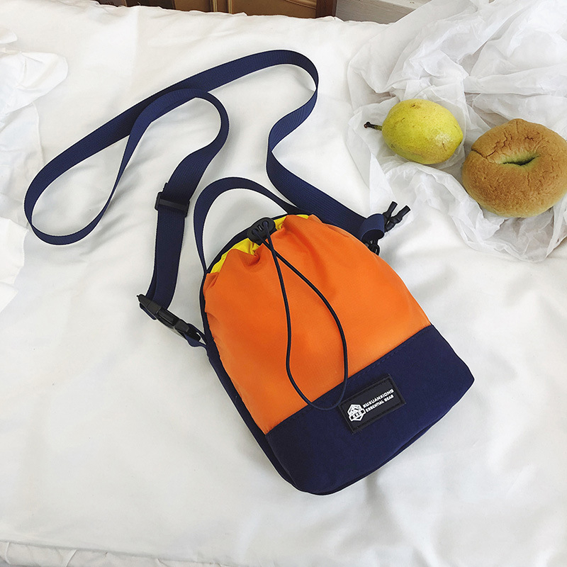 Torba preko ramena za outdoor – stil kanta, najlon, cilindrični oblik, zatvaranje špagom, podstava poliester