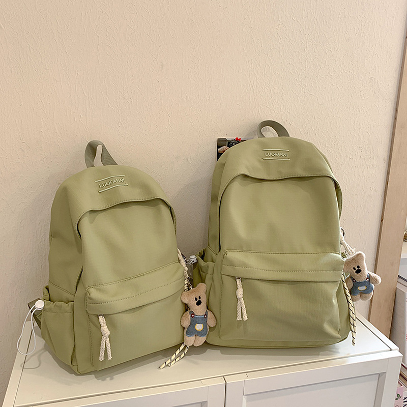 Unisex ruksak za studente za kampus i putovanja, najlon materijal, kapacitet 20–35L, podstava od poliestera, zakrivljene naramenice, mladi kampus stil