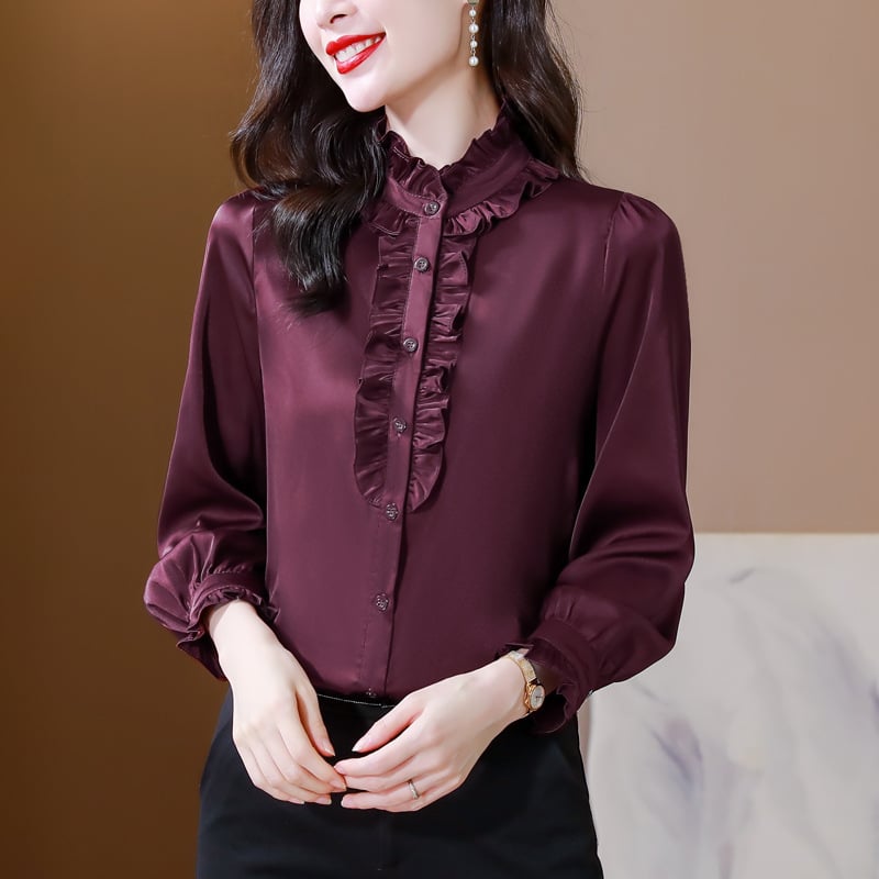 Košulja uskog kroja, stojeći ovratnik i dugi rukavi, jednofarbna tkanina od simuliranog sija, sadržaj glavnog materijala 95%+