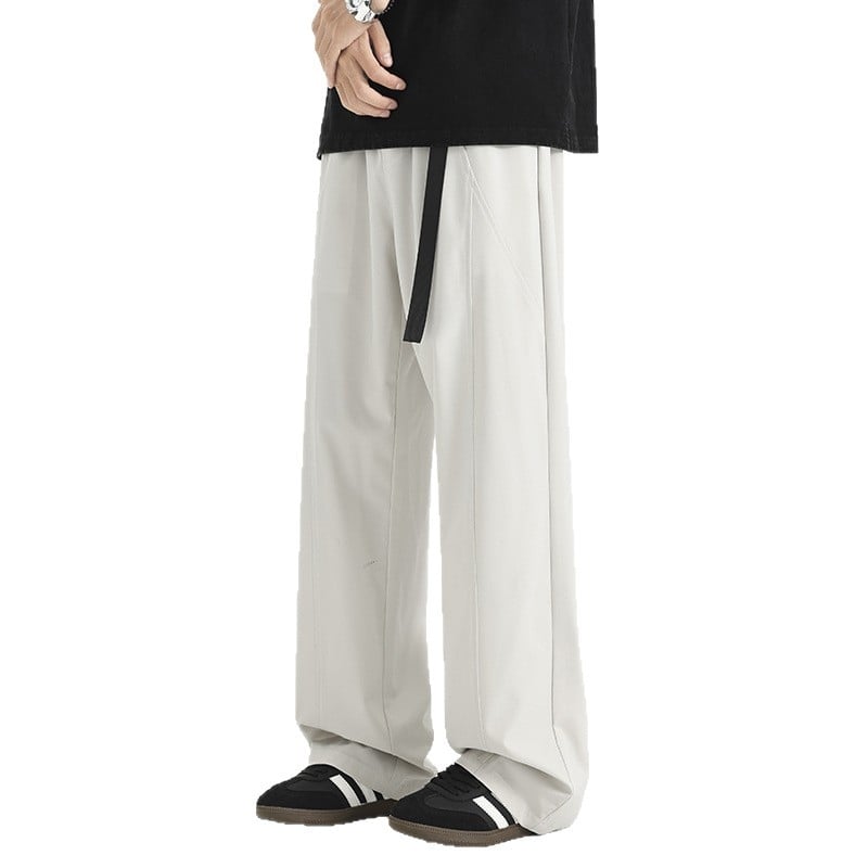 Unisex nohavice v americkom štýle s dekonštruovaným patchworkom, s vstavaným opaskom a gombom, voľný rovný strih, polyester 92%, jeseň 2025