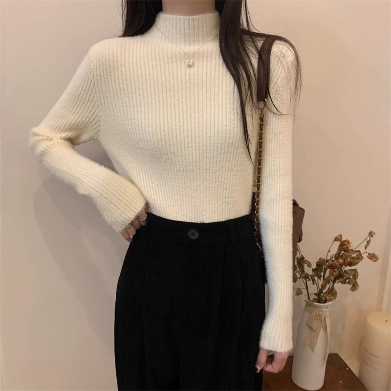 Ženski akrilni džemper s polu-visokim ovratnikom, uski kroj, dugi rukavi, jednofarban