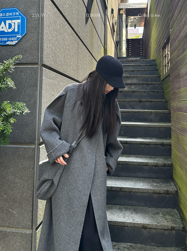 Női gyapjúkabát álló gallérrel, hosszú, vastag anyagú, egyszínű, két soros gombolás