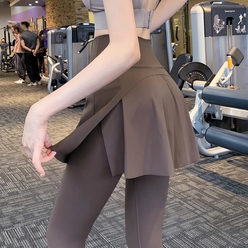 Ženske fitness suknjasto-pantalone s visokim strukom, uski kroj, poliester, visoka elastičnost, jednobojni uzorak, proljeće 2026