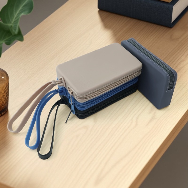 NH599 Szilikon utazási tároló táska, kézitáska stílusú, többfunkciós, kábelek, rúzs és smink számára