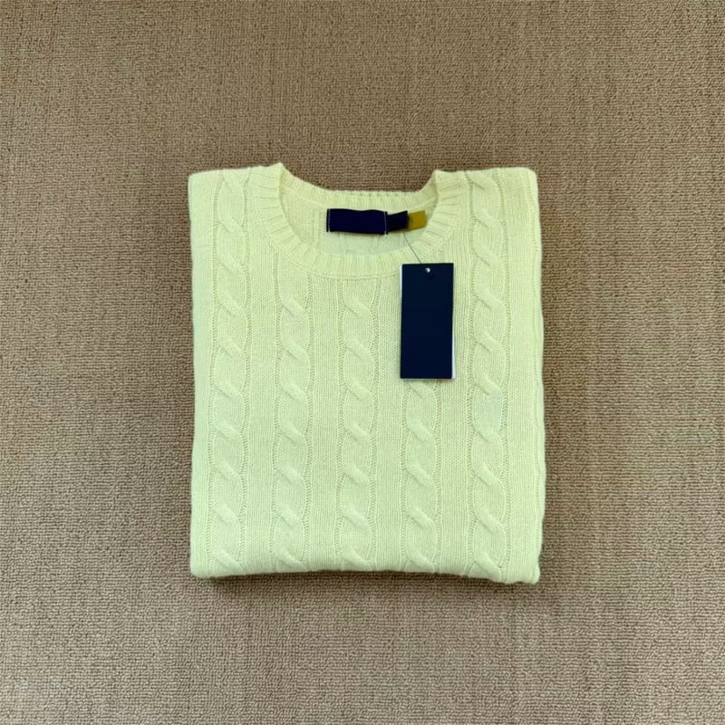 Πουλόβερ από μαλλί με περιεκτικότητα 86–90%, στρογγυλός λαιμός, μακριά μανίκια, twist πλέξη με λεπτομέρεια σε λουλούδι, αντρικό, κλασικό φθινοπωρινό-χειμωνιάτικο.