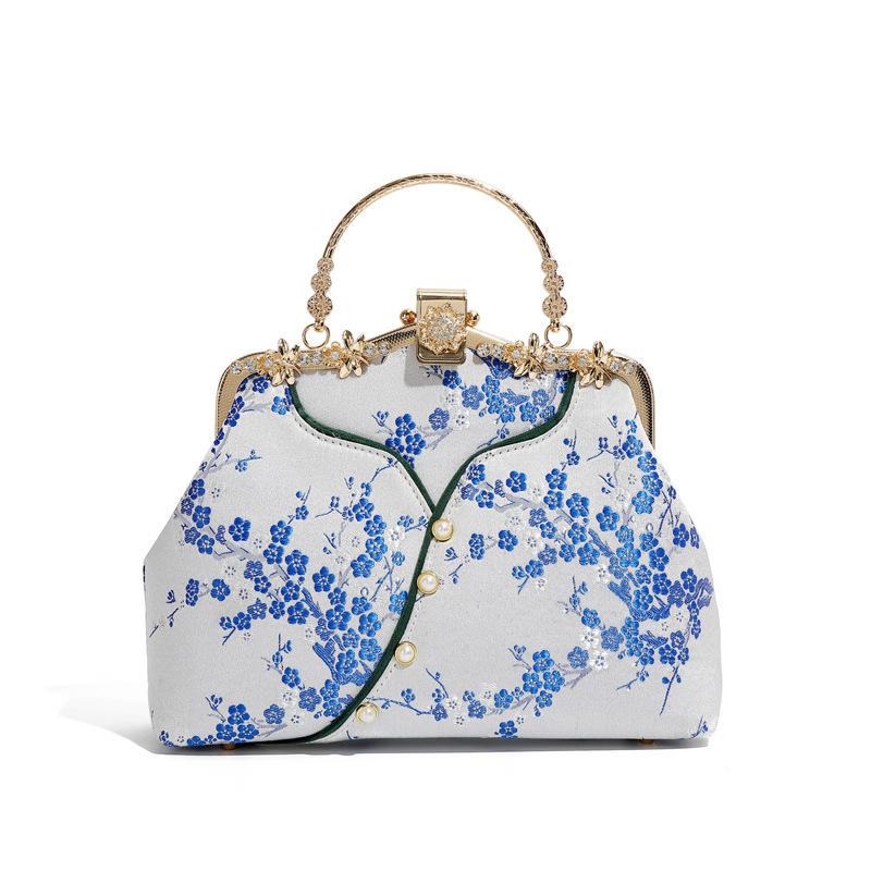 Ženska torba inspirirana kineskim stilom, svila, školjkast oblik, zaključavanje bravom, unutarnji džepovi s patentnim zatvaračem i džep za telefon, s jednim remenom