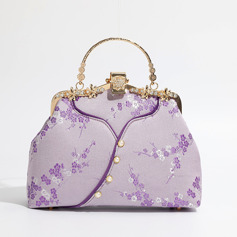 Ženska torba inspirirana kineskim stilom, svila, školjkast oblik, zaključavanje bravom, unutarnji džepovi s patentnim zatvaračem i džep za telefon, s jednim remenom