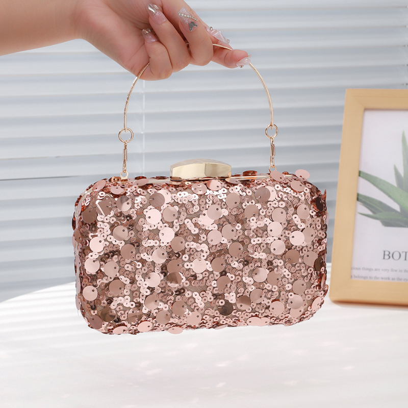 Clutch s šljokicama, horizontalni četverokutni oblik, mala večernja torbica; unutarnja podstava od poliestera; unutarnji džep za telefon; zatvaranje klipsom.