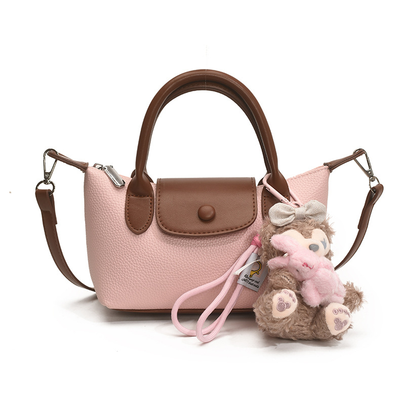 Crossbody torba, gradski minimalistički stil, PU koža, dumpling-tip oblik, otvaranje s poklopcem, poliester podstava