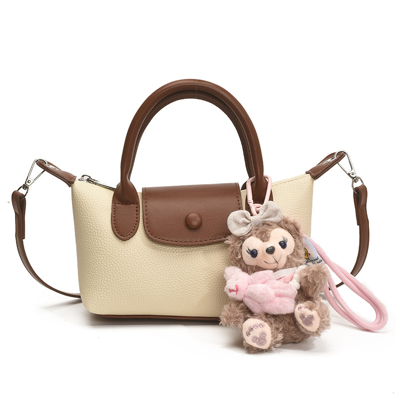 Crossbody torba, gradski minimalistički stil, PU koža, dumpling-tip oblik, otvaranje s poklopcem, poliester podstava